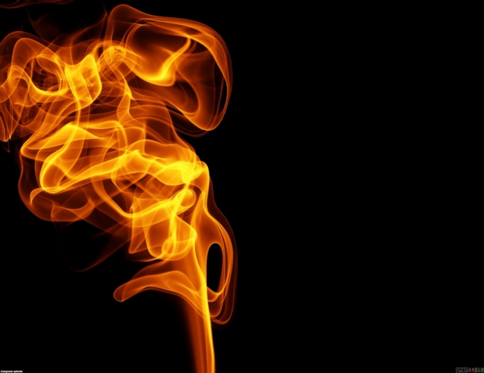 Orange fire flames on black background