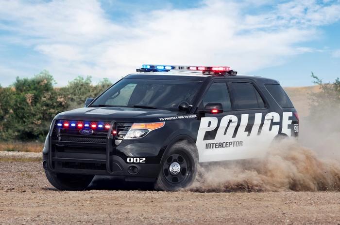Ford Police Interceptor SUV driving off-road