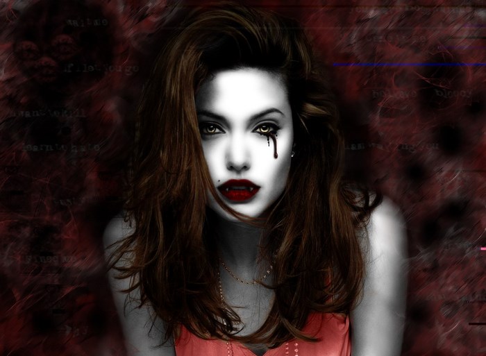 Vampire woman with fangs and blood tears