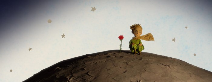 The Little Prince with a rose on a planet