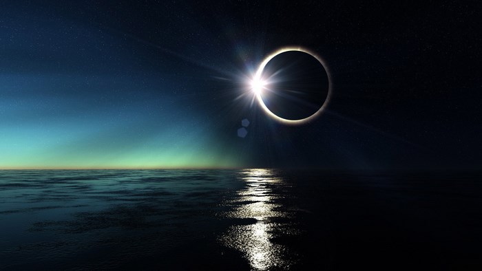 Solar Eclipse Over Ocean