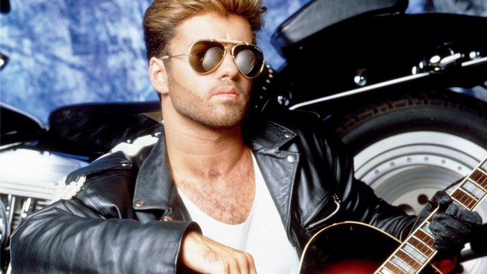 George Michael with guitar and motorcycle