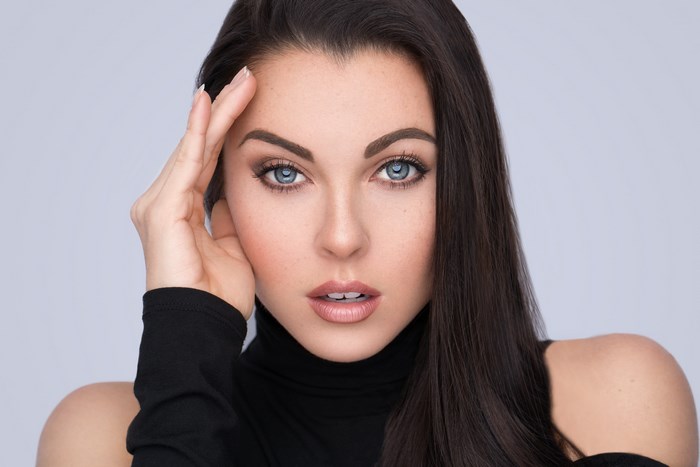 Close-Up Portrait of Woman with Blue Eyes