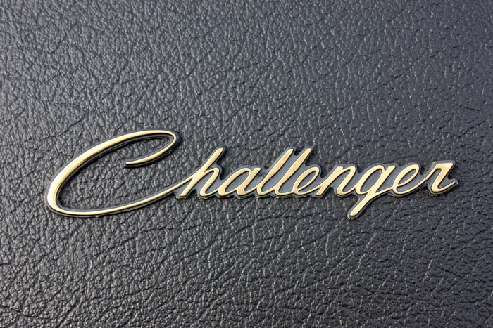 Challenger emblem on a textured surface