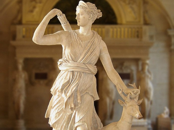 Diana of Versailles sculpture with a deer