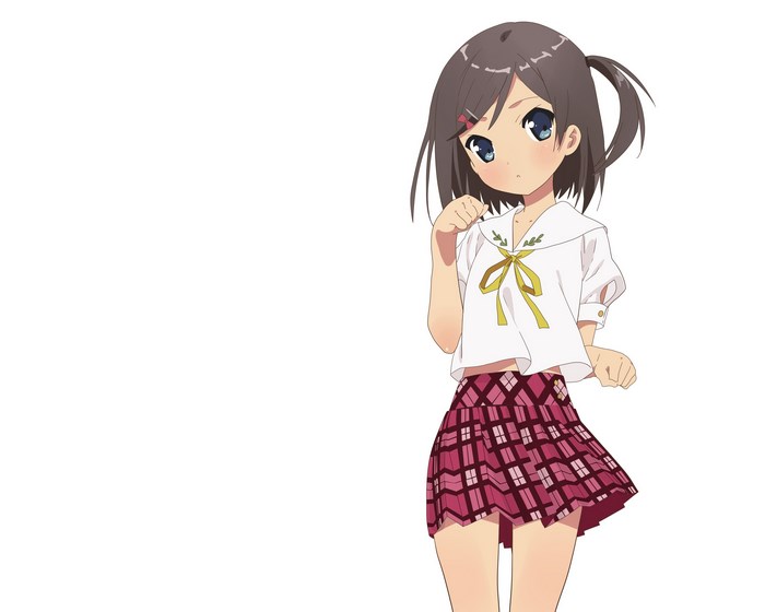 Girl with brown hair in pigtails wearing school uniform