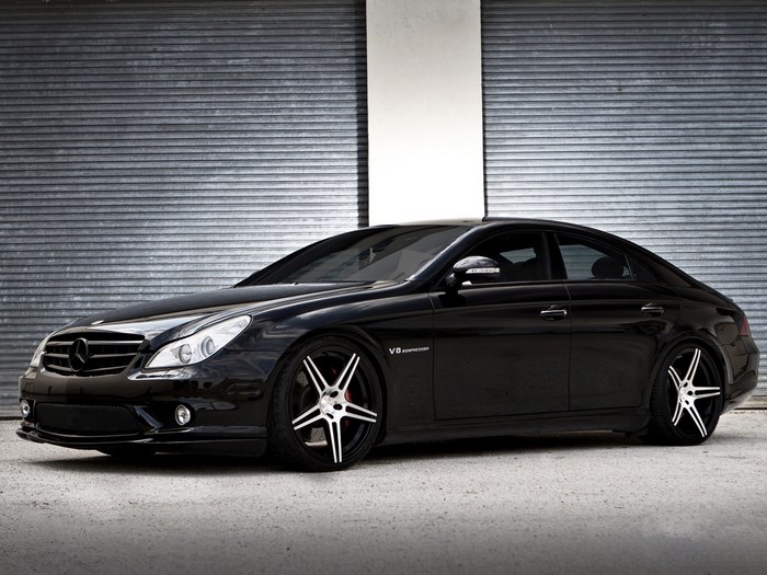 Black Mercedes-Benz CLS 55 AMG with custom wheels