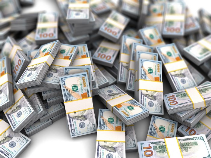 Stacks of Hundred Dollar Bills Spread Out