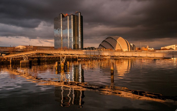Modern buildings and bridge over water