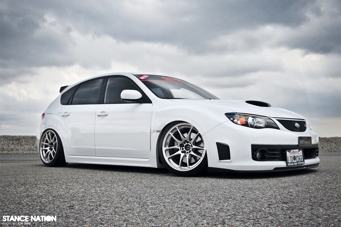 White Subaru Impreza WRX STI hatchback