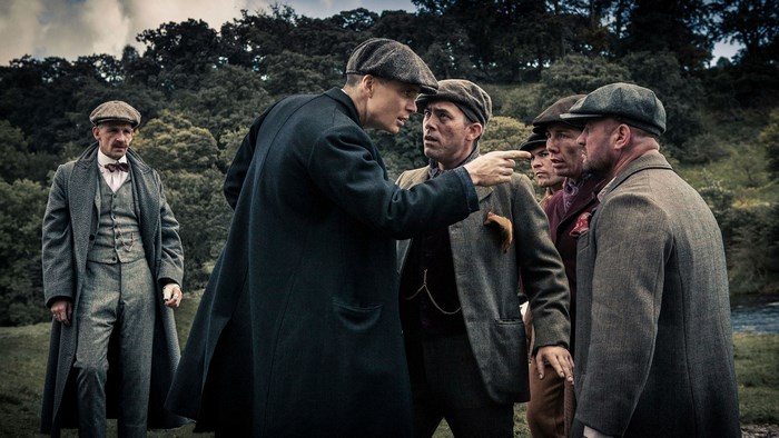 Peaky Blinders characters in a confrontation