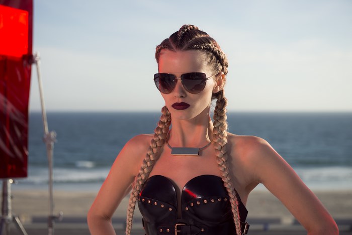 Jesse from The Neon Demon on the beach