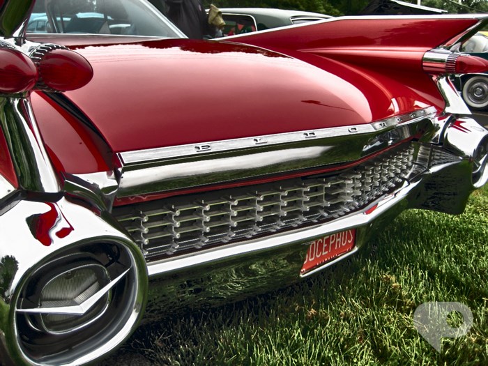 Red Cadillac Eldorado on Grass