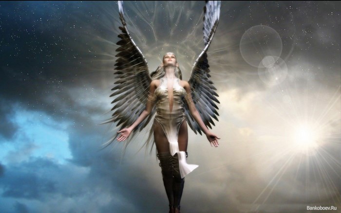Angel with large wings in the sky