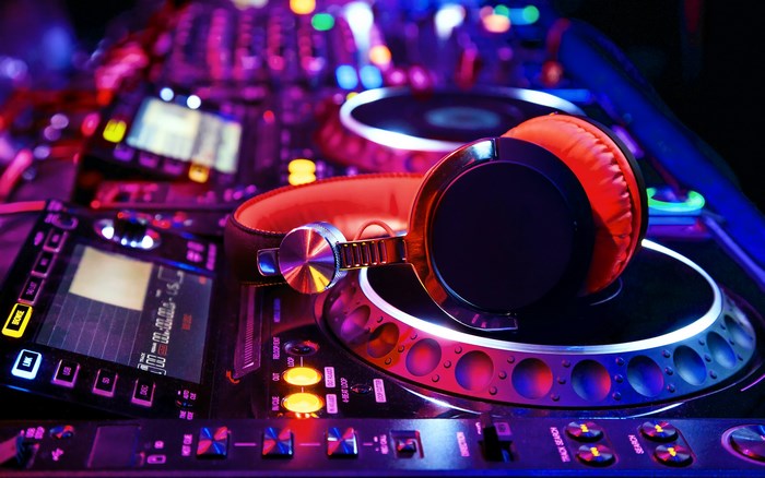 DJ headphones on a mixing console