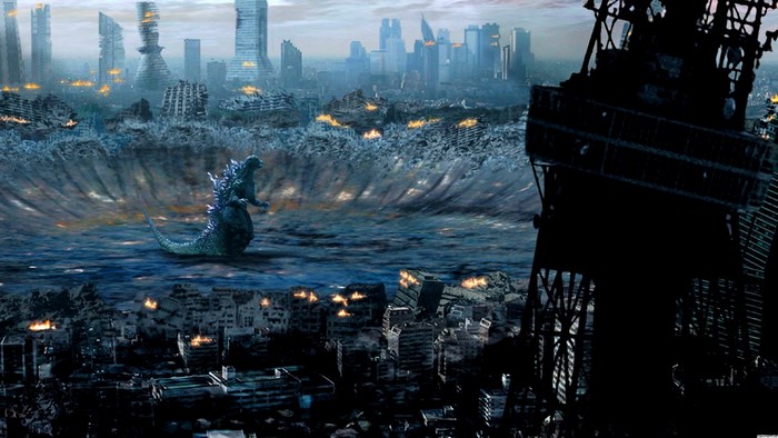 Godzilla in a destroyed city with a tsunami