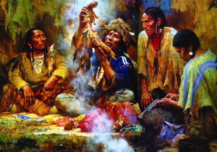 Native American shaman performing a ritual with a sacred object