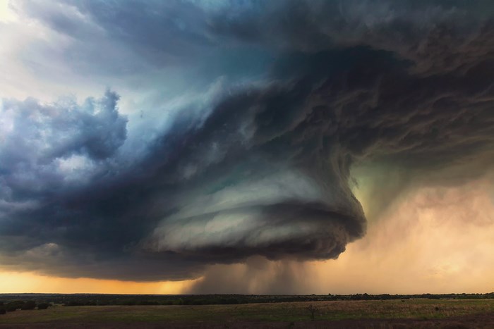 Tornado storm clouds over a field