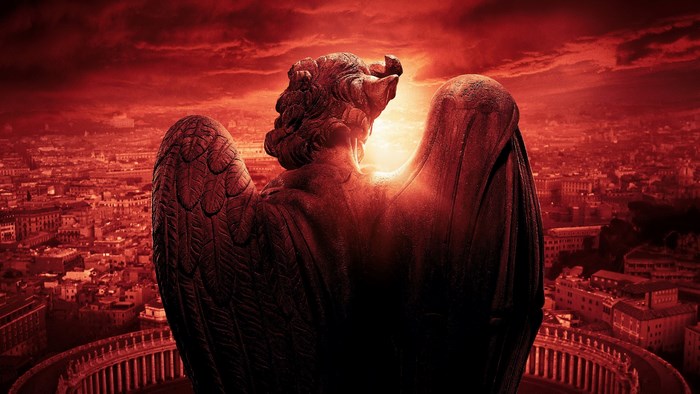 Angels & Demons statue overlooking city