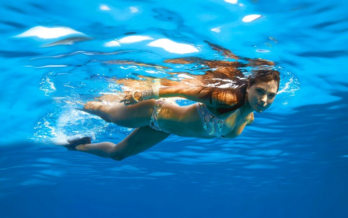 Lara Dutta Swimming Gracefully Underwater in Ocean