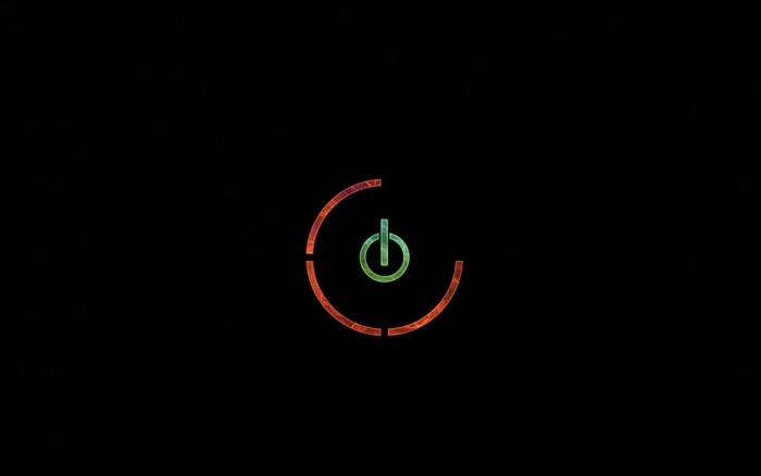 Glowing Power Button with Circular Lines on Black