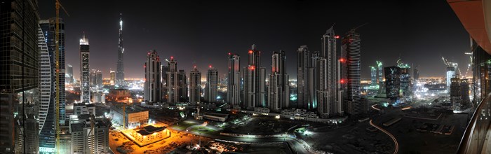 Dubai skyline at night with Burj Khalifa