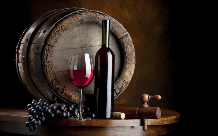 Red Wine Bottle and Glass with Wooden Barrel