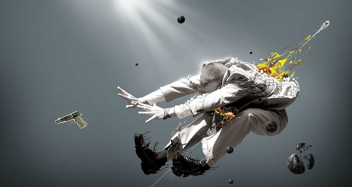Man exploding with gun and balls