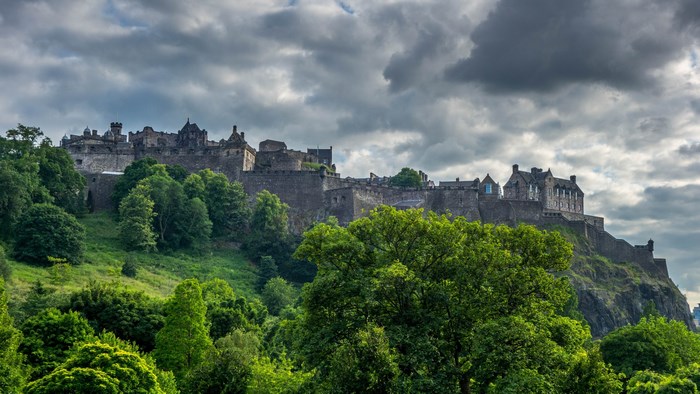 Edinburgh Castle on a hill with trees