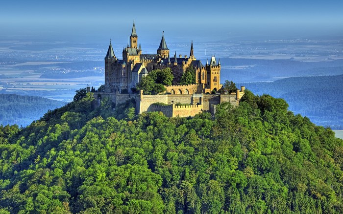 Hohenzollern Castle on a green forested hill