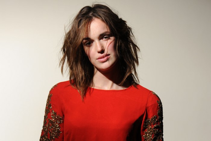 Elizabeth Henstridge in red dress