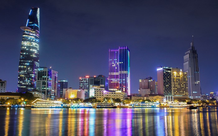 Ho Chi Minh City skyline at night with river