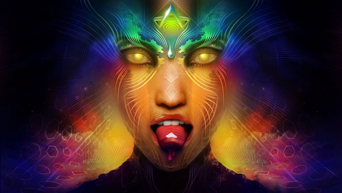 Psychedelic face with glowing eyes and tongue
