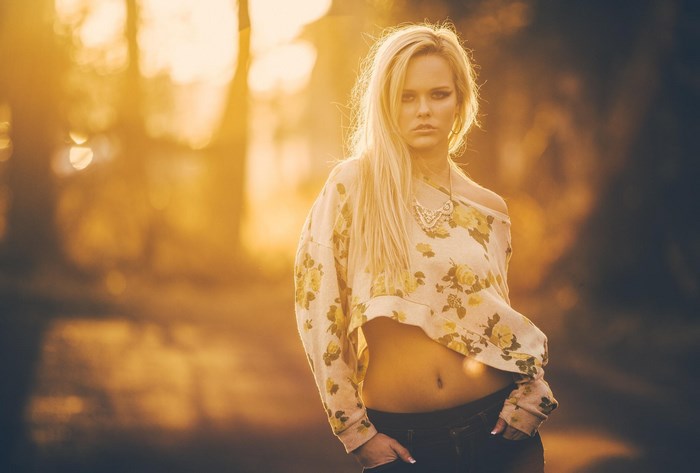 Blonde Woman in Floral Top at Sunset