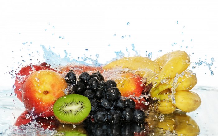 Fresh fruit with water splashes