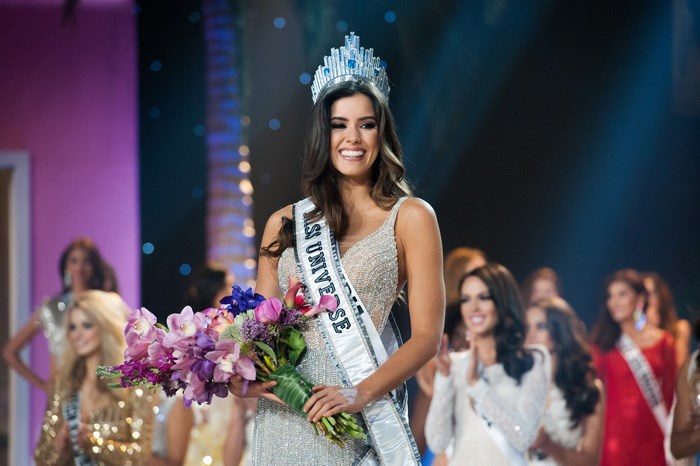 Miss Universe Paulina Vega holding flowers