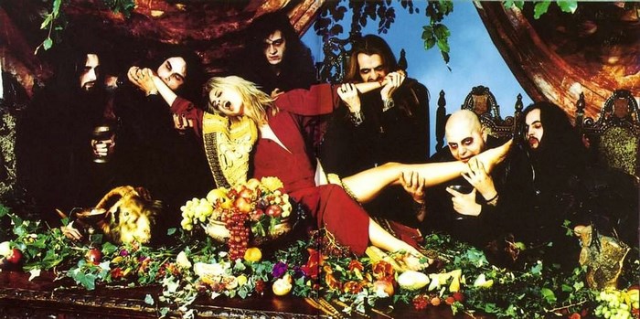 Cradle of Filth band members with a woman
