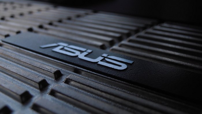 ASUS logo on a textured surface