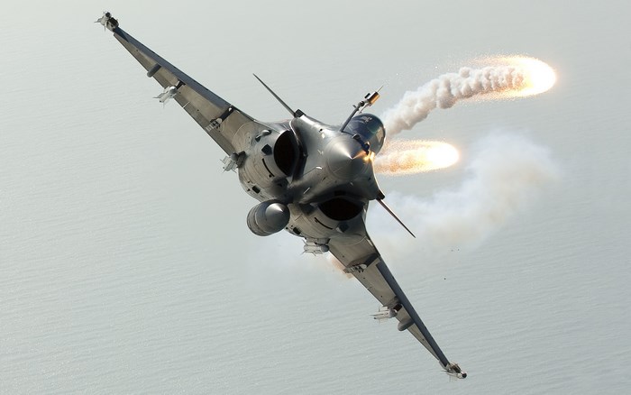 Dassault Rafale fighter jet deploying flares
