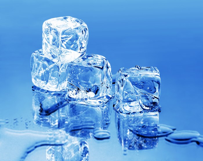 Ice cubes on a blue background