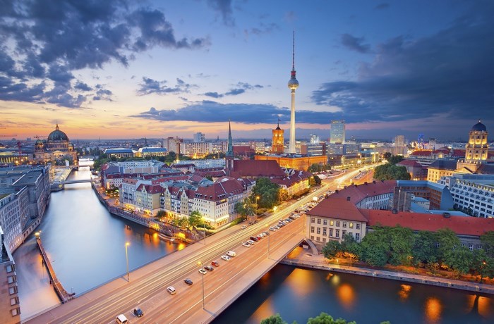 Berlin cityscape with TV Tower and Spree River at dusk