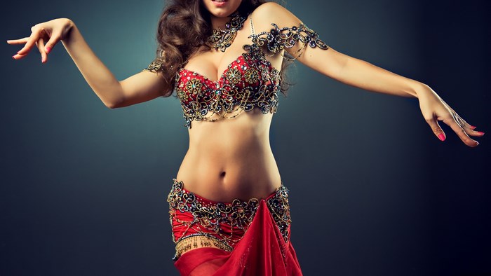 Woman in ornate belly dancing costume