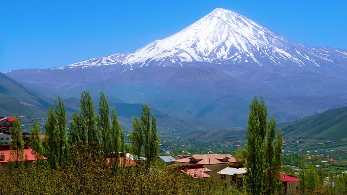 Mount Damavand with village and trees