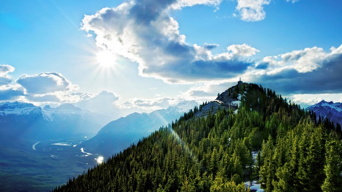 4K Mountain Landscape with Sun and Clouds