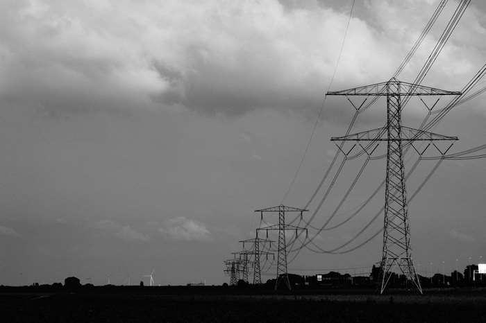 Power lines and pylons in a landscape