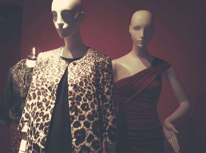 Mannequins in leopard print jacket and red dress