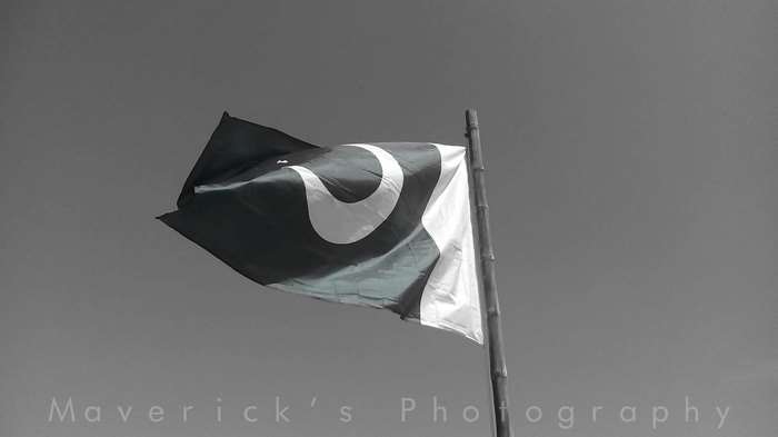 Pakistan flag waving on a flagpole