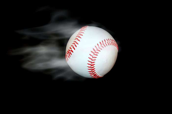Baseball in motion with smoke effect
