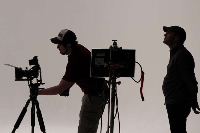 film crew on set in studio