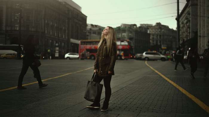 Woman with bag on city street